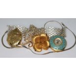A mixed lot of costume jewellery comprising a silver bracelet, a silver necklace, a vintage rolled