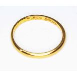 A 22ct gold wedding band, wt. 2.2g, size L.