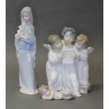 Three Lladro figurines, tallest 23cm.