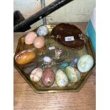 An Eastern brass tray / charger together with selection of various egg ornaments to include