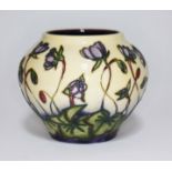 A Moorcroft pottery vase decorated in Hepatica pattern, impressed and painted marks, height 10.
