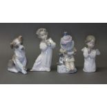 A group of four Lladro figures, tallest 16cm. Condition - good, each appears damage/repair free.