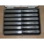 A George V cased set of Art Nouveau style silver handled butter knives, Elkington & Co Ltd,