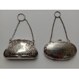 A pair of hallmarked silver purses.