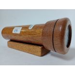 A wooden kaleidoscope on stand. Approx 24cm