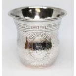 A French silver cup, engraved exterior with Greek Key border, height 6cm, wt. 48g.