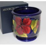 A Moorcroft pottery jardiniere decorated in Hibiscus pattern, impressed and painted marks, height