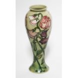 A Moorcroft Collectors Club Sweet Pea vase, impressed and painted marks, height 27cm. Condition -