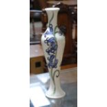 A Moorcroft Blue Bell Harmony vase, impressed and painted marks, height 31cm. Condition - two firing