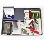 A box of assorted collectables including aerospace items, cigarette cases, a Rotary watch, a