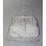 A continental white metal chain mail purse, lined, indistinctly marked, length 36cm (including