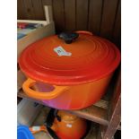 A vintage Le Creuset volcano orange pan no. 26.