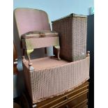 Three pieces of Lloyd Loom furniture; a bedroom chair, an ottoman and a linen basket.