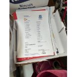 A box containing 100 assorted team sheets