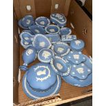 A box of blue and white Wedgwood Jasperware, mostly dishes and lidded dishes, 22 pieces (approx).