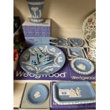A collection of various items of boxed Wedgwood blue and white jasperware including vase, dishes,
