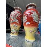 A pair of Japanese vases.