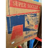 A boxed vintage Super Soccer table top football game.