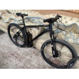 A Cannondale Trail4 CX mountain bike, 27 1/2" wheels, Rockshox front suspension, Shimano group