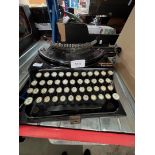 A vintage Remington portable typewriter - no case.