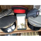 An RAF beret, a 14th Kings Hussar cap, a box containing Royal Horse Artillery brass buttons and