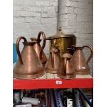 A selection of Copper Jugs and a Brass coal bucket