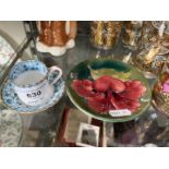 A Moorcrof pottery dish and a Copeland cabinet cup and saucer.