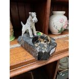 Black veined marble ashtray with spelter dog. L20cm