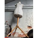 A half length mannequin on stand