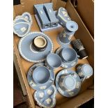 A box of mostly blue and white Wedgwood Jasperware including teacups, candlesticks, dishes etc, 20