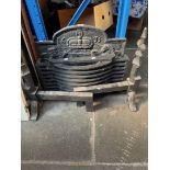 Cast iron fire grate, fire back dated 1633, fire dogs