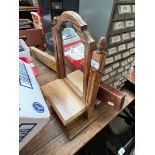 A wood Rabone Spirit level and a small wooden swing mirror with a drawer.