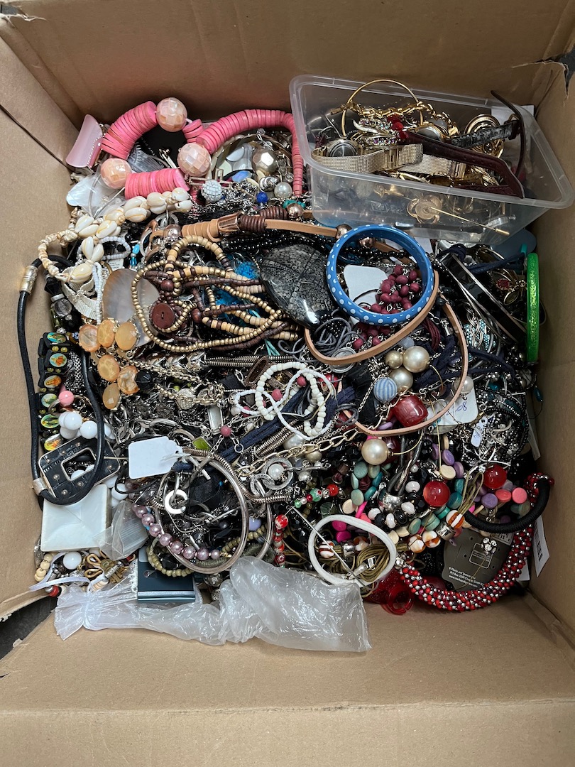 A box of costume jewellery and watches, etc.