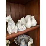 Two lladro polar bears and doves
