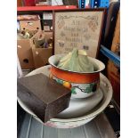 A modern sampler, framed and glazed, a wash bowl, bedpan, and metal box with toy car