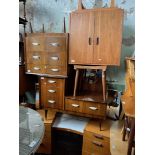 Various items of mid 20th century furniture; two dressing tables, a chest of drawers, a record