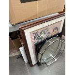 A quantity of pictures and a mirror with metal frame