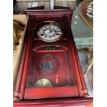 A Lincoln 31 day wall clock with pendulum - no key.