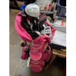 A Ladies set of golf clubs complete with Pink Bag