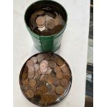 Two tins of mainly copper pennies.