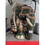 A garden ceramic elephant seat