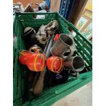 A box of miscellaneous to include brass and copper pumps, a vice, brass enamelled pepper and salt,