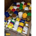 A box containg various unused enameled spray paints (approx 39).