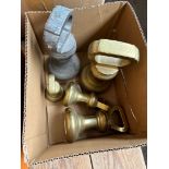 A box of brass bell weights