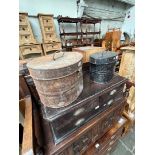 Two antique metal hat tins.