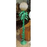 A retro standard lamp modelled as palm leaves with glass shade, height 160cm.