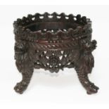 A Chinese carved hardwood stand, height 26cm.
