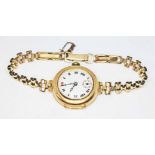 An 18ct gold Tegra watch with rolled gold strap, gross wt. 21.5g.