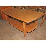 An Ercol light elm coffee table.