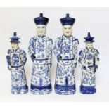 A group of four Chinese blue and white porcelain figures, 20th century, seal marks to base,